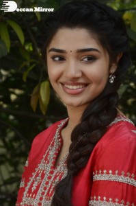 Actress Krithi Shetty in a red color salwar dress