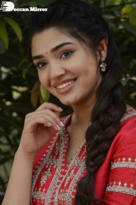 Actress Krithi Shetty in a red color salwar dress