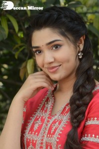 Actress Krithi Shetty in a red color salwar dress