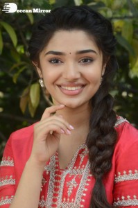 Actress Krithi Shetty in a red color salwar dress