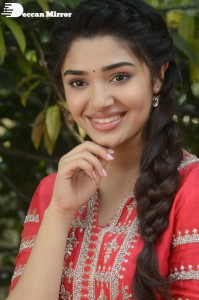 Actress Krithi Shetty in a red color salwar dress