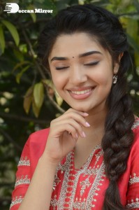 Actress Krithi Shetty in a red color salwar dress