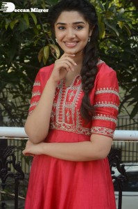 Actress Krithi Shetty in a red color salwar dress