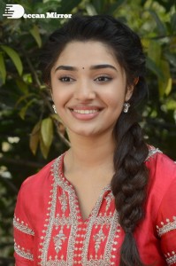 Actress Krithi Shetty in a red color salwar dress