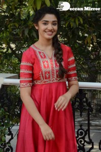 Actress Krithi Shetty in a red color salwar dress