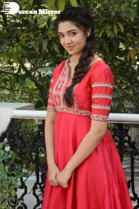 Actress Krithi Shetty in a red color salwar dress