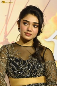 actress Krithi Shetty in a black dress at a function