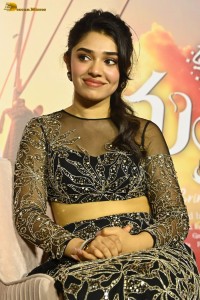 actress Krithi Shetty in a black dress at a function