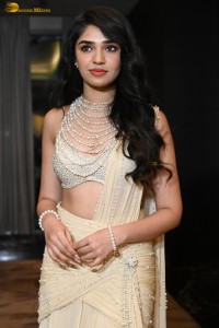 actress Krithi Shetty pretty in a white dress at a movie event