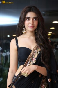 actress Krithi Shetty stunning in a black saree