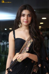 actress Krithi Shetty stunning in a black saree