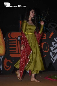 Actress Krithi Shetty dressed in a green Salwar Kameez dress while attending Bangarraju movie funciton