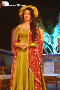 Actress Krithi Shetty dressed in a green Salwar Kameez dress while attending Bangarraju movie funciton