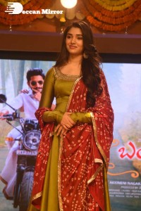 Actress Krithi Shetty dressed in a green Salwar Kameez dress while attending Bangarraju movie funciton