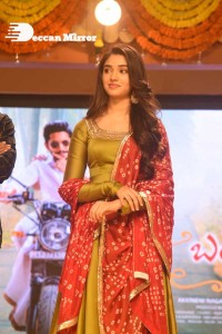 Actress Krithi Shetty dressed in a green Salwar Kameez dress while attending Bangarraju movie funciton