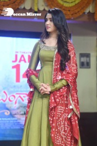 Actress Krithi Shetty dressed in a green Salwar Kameez dress while attending Bangarraju movie funciton