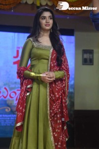 Actress Krithi Shetty dressed in a green Salwar Kameez dress while attending Bangarraju movie funciton