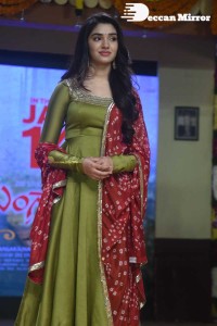 Actress Krithi Shetty dressed in a green Salwar Kameez dress while attending Bangarraju movie funciton