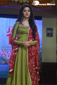 Actress Krithi Shetty dressed in a green Salwar Kameez dress while attending Bangarraju movie funciton