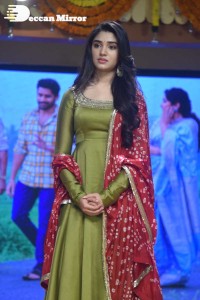 Actress Krithi Shetty dressed in a green Salwar Kameez dress while attending Bangarraju movie funciton
