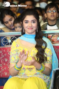 Actress Krithi Shetty in a Yellow Dress