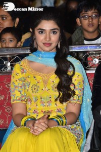 Actress Krithi Shetty in a Yellow Dress