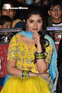 Actress Krithi Shetty in a Yellow Dress