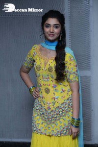 Actress Krithi Shetty in a Yellow Dress
