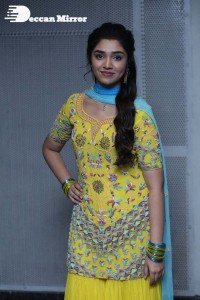 Actress Krithi Shetty in a Yellow Dress