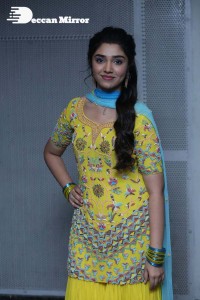 Actress Krithi Shetty in a Yellow Dress