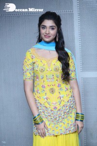 Actress Krithi Shetty in a Yellow Dress