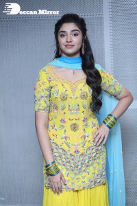 Actress Krithi Shetty in a Yellow Dress