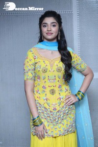 Actress Krithi Shetty in a Yellow Dress