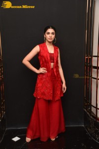 Actress Krithi Shetty in a red dress