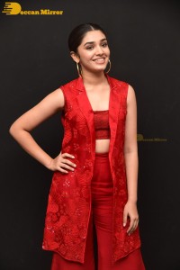 Actress Krithi Shetty in a red dress