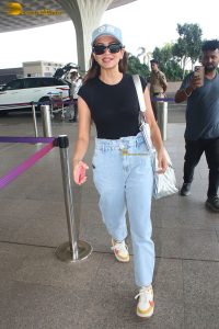 actress Kriti Kharbanda chic look in black top and sunglasses