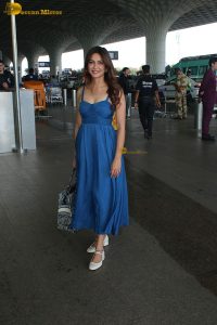 telugu actress Kriti Kharbanda cute in a blue dress at mumbai airport