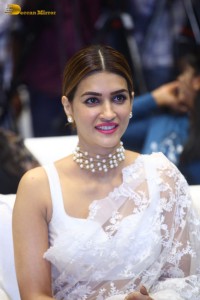 Indian Actress Kriti Sanon in a white saree while attending a movie function