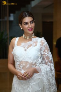 Indian Actress Kriti Sanon in a white saree while attending a movie function