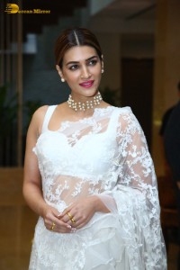 Indian Actress Kriti Sanon in a white saree while attending a movie function