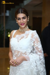 Indian Actress Kriti Sanon in a white saree while attending a movie function