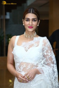 Indian Actress Kriti Sanon in a white saree while attending a movie function