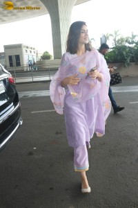 Actress kriti sanon in a pink salwar suit at mumbai airport