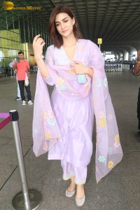 Actress kriti sanon in a pink salwar suit at mumbai airport