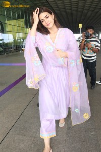 Actress kriti sanon in a pink salwar suit at mumbai airport