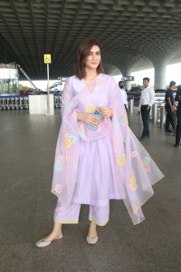 Actress kriti sanon in a pink salwar suit at mumbai airport