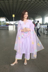 Actress kriti sanon in a pink salwar suit at mumbai airport