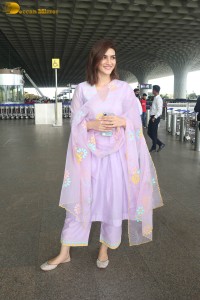 Actress kriti sanon in a pink salwar suit at mumbai airport