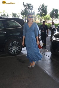 actress kriti sanon seen in a blue dress at airport
