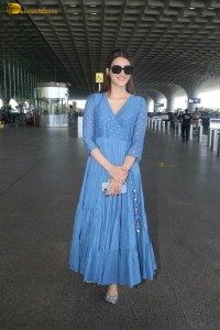 actress kriti sanon seen in a blue dress at airport
